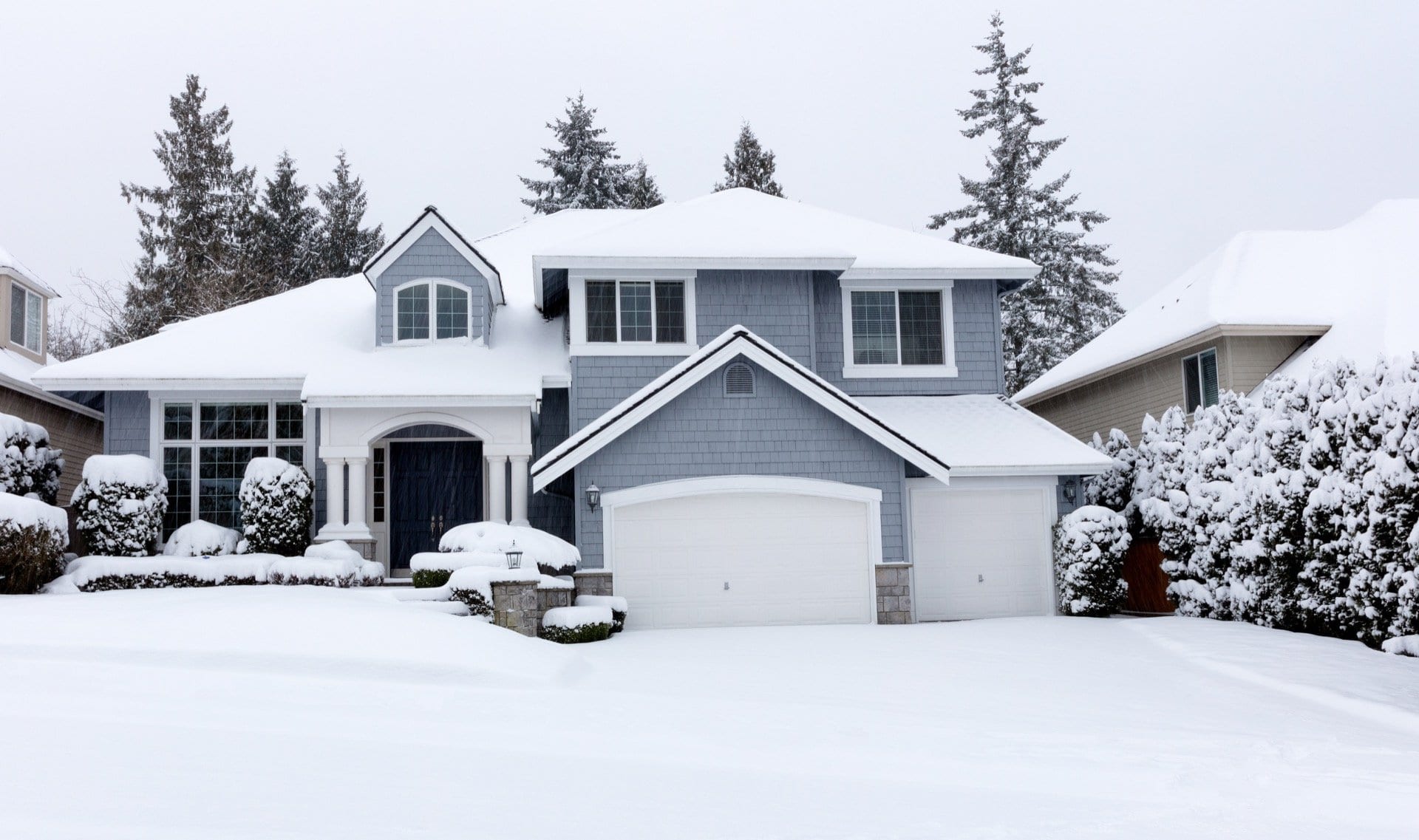 luxury-home-exterior-after-snowfall